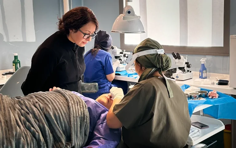 doctor Rezvani overseeing hair transplantion procedure